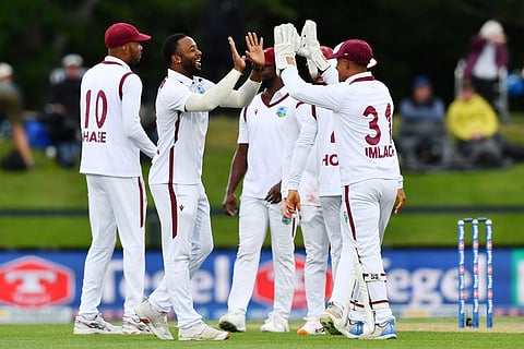 West Indies' Ojay Shields (2nd L) celebrates the wicket of New Zealand's Michael Bracewell with his teammates during day one of the first Test cricket match at Hagley Oval in Christchurch on December 2, 2025.