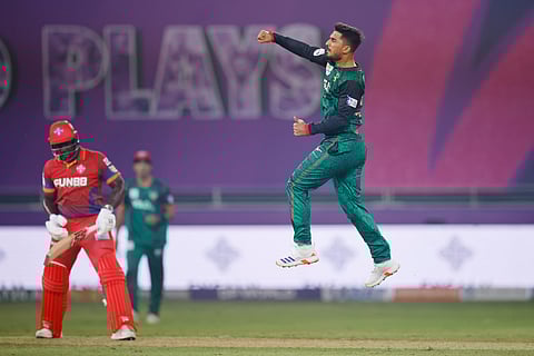 Khuzaima Tanveer of Desert Vipers celebrates the wicket of Rovman Powell.