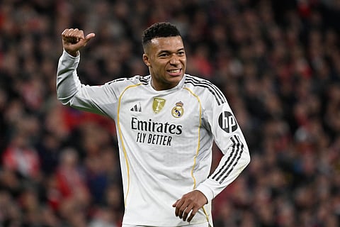 Real Madrid's French forward #10 Kylian Mbappe gestures during the Spanish league football match between Athletic Club Bilbao and Real Madrid CF at the San Mames stadium in Bilbao on December 3, 2025.