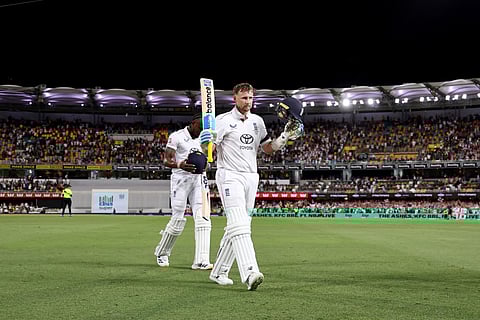 England's Joe Root walks off the ground at the end of day one of the second Ashes cricket Test match against Australia at The Gabba in Brisbane on December 4, 2025.