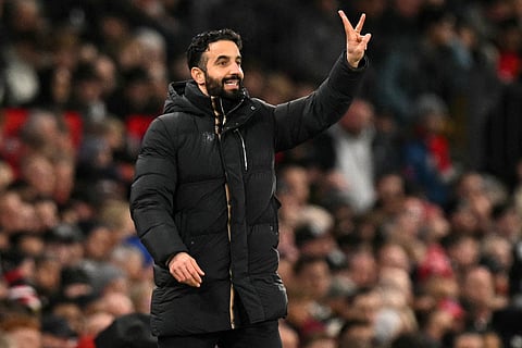 Manchester United's Portuguese head coach Ruben Amorim gestures during the English Premier League football match between Manchester United and West Ham United at Old Trafford in Manchester, north west England, on December 4, 2025.