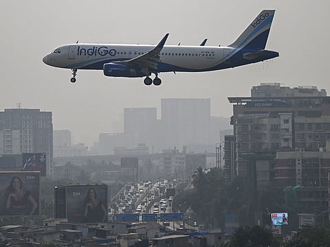An IndiGo aircraft prepares to land at the Mumbai airport on Saturday, December 6, 2025.