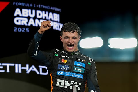 McLaren's Lando Norris celerbrate after winning his first Formula 1 drivers' championship with Abu Dhabi winner at the Formula 1 Etihad Airways Abu Dhabi Grand Prix 2025.