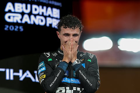 McLaren's Lando Norris celebrate after winning his first Formula 1 drivers' championship with Abu Dhabi winner at the Formula 1 Etihad Airways Abu Dhabi Grand Prix 2025.