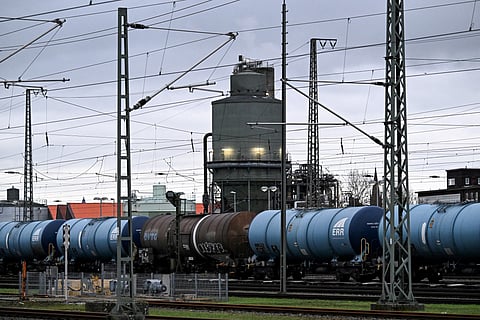Railway tank cars with the logo of ERR European Rail Rent are pictured in an industrial area in Frankfurt am Main, western Germany, on December 8, 2025.