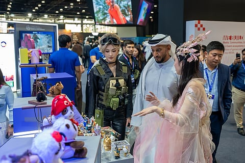Sheikh Abdulla bin Mohamed bin Butti Al Hamed during his tour of the “ChinaJoy” pavilion at the BRIDGE 2025 Summit.
