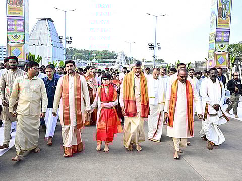 Andhra Pradesh Chief Minister Chandrababu Naidu, his son Nara Lokesh and grandson Nara Devansh arrive at Sri Venkateswara Swamy temple in a file picture. Two labs independently certified that the dupattas were 100% polyester, not mulberry silk.