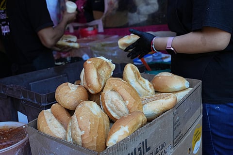 Bolillos, a traditional Mexican bread, sit for sale at a street stand in Mexico City, Thursday, Dec. 18, 2025.