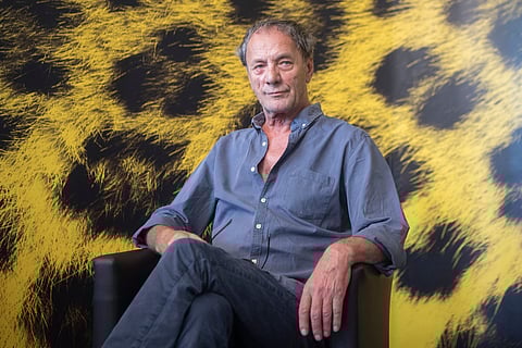 Palestinian actor Mohammed Bakri poses during the photocall for the film "Wajib" at the 70th Locarno International Film Festival in Locarno, Switzerland, on Aug. 5, 2017.