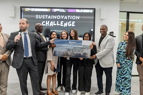 Sustainovation Challenge winners receiving their awards from organisers, DMU Dubai and Ehfaaz