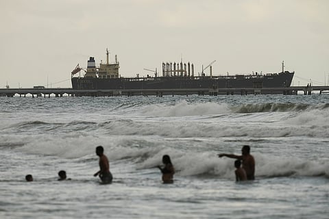 Evana, an oil tanker, is docked at El Palito port in Puerto Cabello, Venezuela, Sunday, Dec. 21, 2025. (AP Photo/Matias Delacroix)