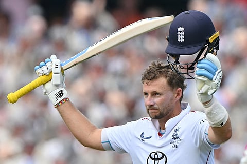 England’s Joe Root celebrates reaching his century (100-runs) on day two of the fifth Ashes cricket Test match between Australia and England at the Sydney Cricket Ground (SCG) in Sydney on January 5, 2026.