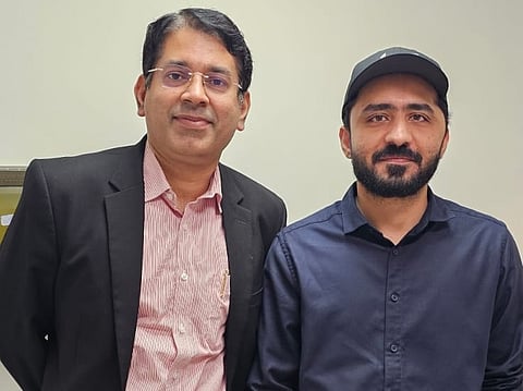 Dr Prakash Nair, Consultant Neurosurgery, Aster Hospital Mankhool, with Emad Arif Khan.