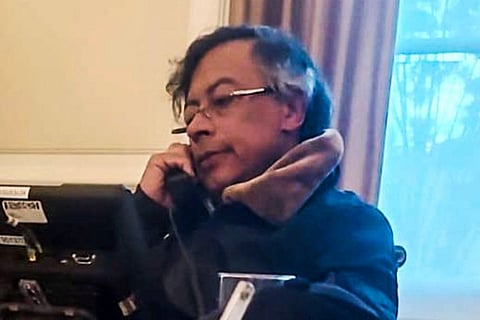 Handout video grab provided by Colombia's presidency press office showing Colombia's President Gustavo Petro talking on the phone with his US counterpart Donald Trump, at Narino Palace in Bogota on January 7, 2026.