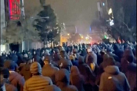 In this frame grab from footage circulating on social media from Iran showed protesters once again taking to the streets of Tehran despite an intensifying crackdown as the Islamic Republic remains cut off from the rest of the world in Tehran, Iran, Saturday Jan. 10, 2026. (UGC via AP)