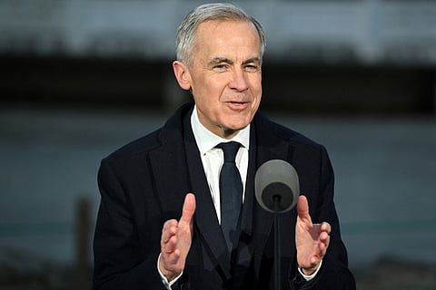 Canada's Prime Minister Mark Carney speaks during a press conference at Ritan Park in Beijing on January 16, 2026.