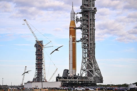 NASA's Artemis II Space Launch System rocket and Orion spacecraft are rolled out of the Vehicle Assembly Building to Launch Pad 39B.