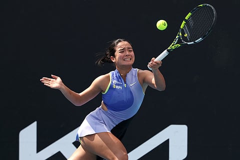 Philippines’ Alexandra Eala hits a return to USA’s Alycia Parks during their women’s singles match against on day two of the Australian Open tennis tournament in Melbourne on January 19, 2026.