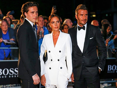 Brooklyn Beckham with David Beckha, Victoria Beckham