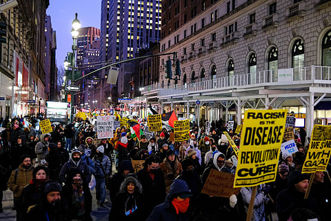 People take part in the nationwide "Stop ICE Terror" rally in New York on January 20, 2026, protesting US President Donald Trump’s immigration policies.