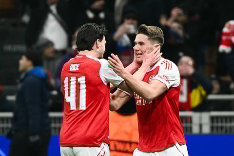 Arsenal's Swedish striker Viktor Gyokeres celebrates with Arsenal's English midfielder Declan Rice