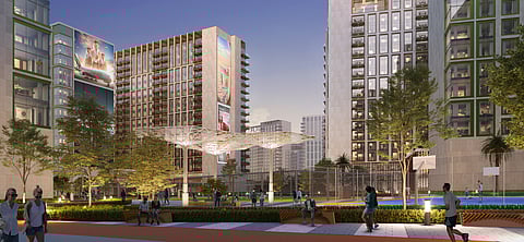 Artist impression of Emirates’ planned cabin crew village at Dubai Investments Park, featuring 20 residential towers and lifestyle amenities.