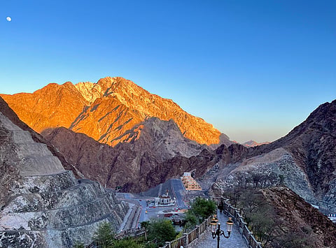 A serene view of the Hajar Mountains from Shees Park in Khorfakkan, captured by Devika Jayakumar.