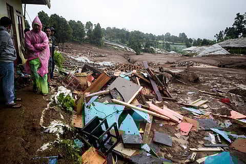 Debris from destroyed houses remains after a landslide struck in Pasirlangu village, Bandung, West Java.