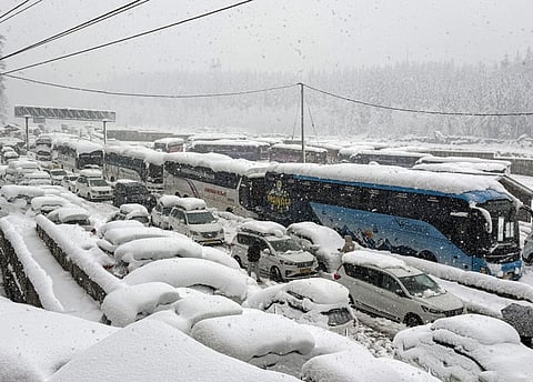 A long traffic jam of tourist vehicles formed on the Manali highway after heavy snowfall forced its closure in Himachal Pradesh.