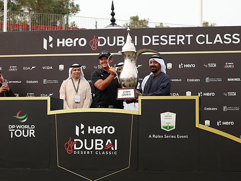 Ahmed bin Saeed presents Patrick Reed Hero Dubai Desert Classic trophy after thrilling victory