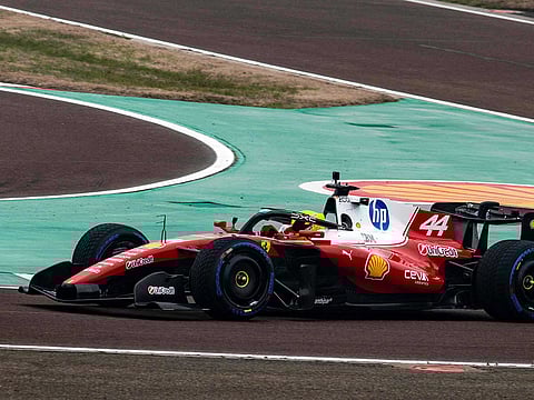 Lewis Hamilton (44) of Great Britain waves to fans as he steers the new Formula 1 Ferrari SF-26 during tests at Fiorano Circuit in Fiorano Modenese.