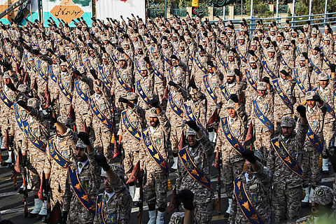 This handout file picture provided by the Iranian presidency on September 22, 2019 shows members of Iran's Islamic Revolutionary Guard Corps (IRGC) giving a military salute during a military parade in Tehran.