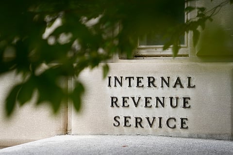 FILE - A sign is displayed outside the Internal Revenue Service building May 4, 2021, in Washington.