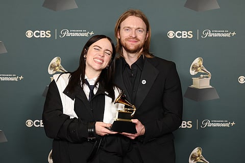 Billie Eilish and FINNEAS, winners of the Song Of The Year award for "WILDFLOWER", pose in the press room during the 68th GRAMMY Awards at Crypto.com Arena on February 01, 2026 in Los Angeles, California.