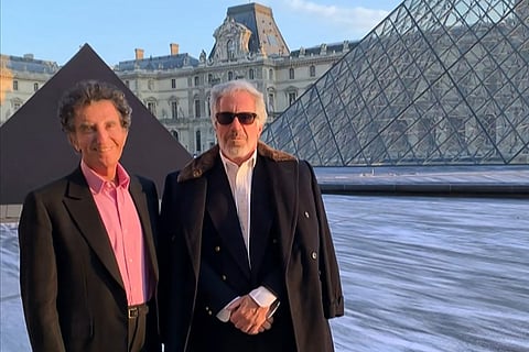 A screengrab taken on February 3, 2026 from a video released in files related to the investigation into the late convicted sex offender Jeffrey Epstein, published by the US Department of Justice, shows Jack Lang, a French former culture minister posing with Jeffrey Epstein at the Louvre pyramid in Paris.