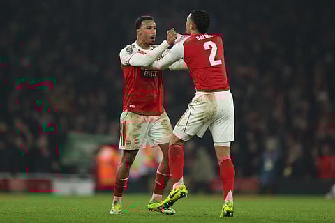 Gabriel celebrates with Arsenal's French defender William Saliba after win over Chelsea