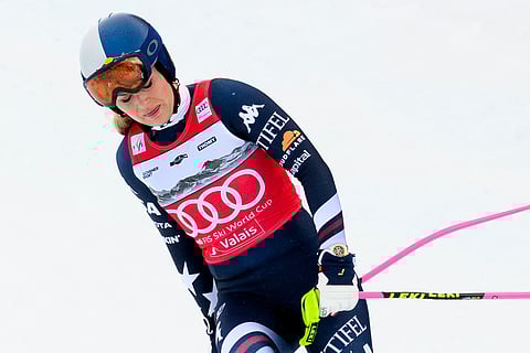 United States' Lindsey Vonn approaches the finish area after crashing, during an alpine ski, women's World Cup downhill, in Crans Montana, Switzerland, Friday, Jan. 30, 2026.