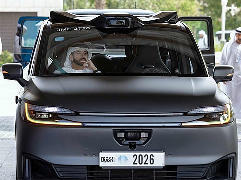 Sheikh Hamdan takes first ride in the fully autonomous RT6 taxi vehicles developed by Baidu Apollo Go.