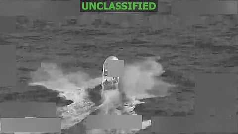 A screengrab from a Pentagon video shows an alleged drug-trafficking boat in the eastern Pacific Ocean before it was struck on Thursday, killing two people, according to US Southern Command. Death toll in Washington's campaign rises to at least 128 since it began in September