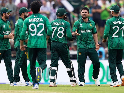 Pakistan's Abrar Ahmed, second right, celebrates with teammates the wicket of Netherlands' Colin Ackermann during the T20 World Cup cricket match in Colombo, Sri Lanka, Saturday, Feb. 7, 2026.