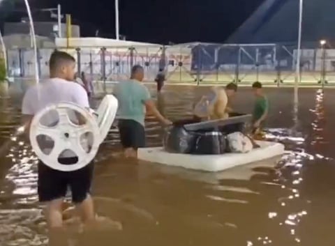 Torrential rain in Colombia triggered flooding and landslides as rain-swollen streams overflowed and inundated houses.