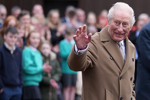 Britain's King Charles III waves as he leaves after a visit to Butlers Dairy in Inglewhite, near Preston, north-west England on February 9, 2026, to mark the opening of new facilities following a fire in 2023.