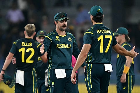 Australia's captain Travis Head (C) celebrates with teammates their team's win at the end of the 2026 ICC Men's T20 Cricket World Cup group stage match between Ireland and Australia at R Premadasa Stadium in Colombo on February 11, 2026.