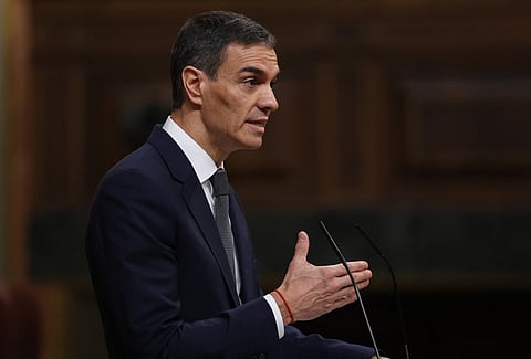 Spain's Prime minister Pedro Sanchez gestures as he addresses parliament over January train tragedy at the congress in Madrid on February 11, 2026.