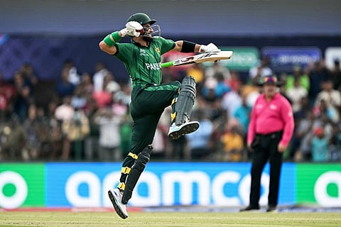 Pakistan's Sahibzada Farhan celebrates after scoring a century (100 runs) during the 2026 ICC Men's T20 Cricket World Cup group stage match between Pakistan and Namibia at the Sinhalese Sports Club (SSC) Ground in Colombo on February 18, 2026.