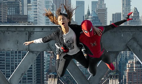 Tom Holland and Zendaya as Peter Parker and MJ.