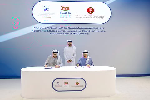 Mohammad Al Gergawi and Hussain Sajwani signing agreement in the presence of Sheikh Hamdan bin Mohammed bin Rashid Al Maktoum