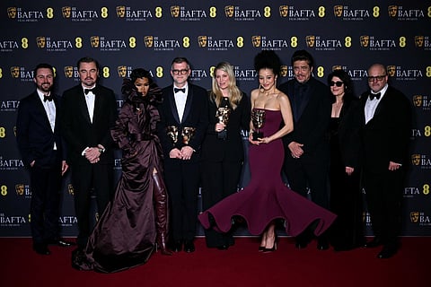 US actor Leonardo DiCaprio, American singer-songwriter and actor Teyana Taylor, US film director Paul Thomas Anderson, US film producer Sara Murphy and Puerto Rican actor Benicio del Toro pose with the award for Best film for "One Battle After Another" during the BAFTA British Academy Film Awards ceremony at the Royal Festival Hall, Southbank Centre, in London, on February 22, 2026.