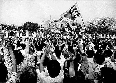 A scene on EDSA during the "People Power" revolt on February 25, 1986, showing the collective show of action of millions who marched along the streets to protest the excesses of the 21-year regime of Ferdinand Marcos Sr.