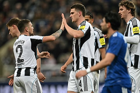 Newcastle United's Dutch defender Sven Botman (C) celebrates with teammates after scoring their third goal during the Uefa Champion's League knockout round play-off, 2nd leg football match between Newcastle United and Qarabag at St James' Park in Newcastle-upon-Tyne, north east England on February 24, 2026.